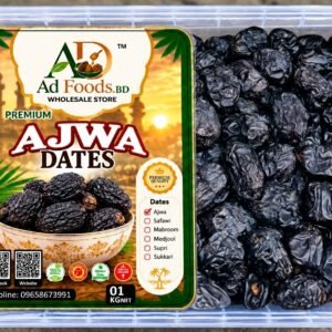 Dark Ajwa dates in a clear plastic container with AD Foods BD label